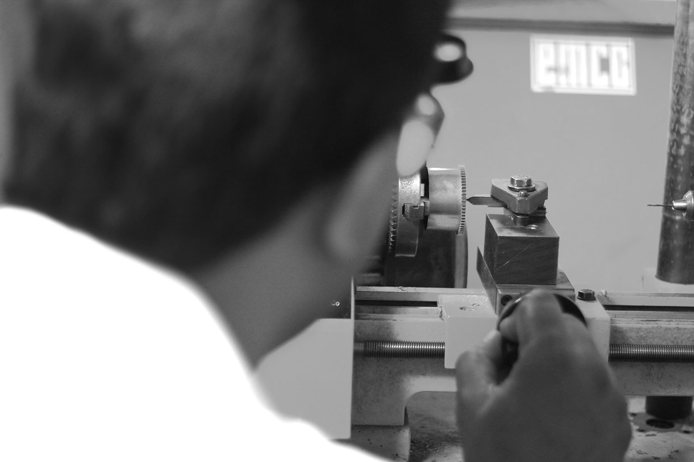 Devan Moodley working on lathe in workshop